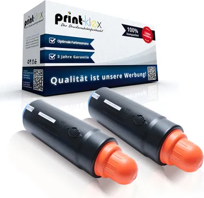 Two black toner cartridges with orange caps are displayed in front of their packaging.