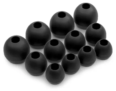 A collection of black silicone ear tips for headphones.