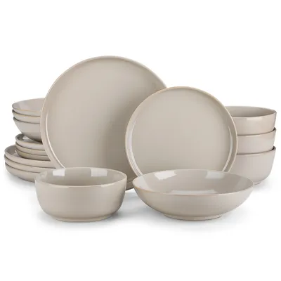 A set of stoneware dinnerware, including plates and bowls, arranged on a white background.