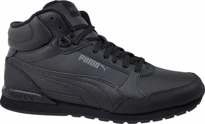 A black Puma mid-top sneaker is shown against a white background.
