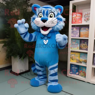 Produktbild von Blauer REDBROKOLY Tiger Maskottchen Kostüm charakter bekleidet mit einer Culotte und Broschen