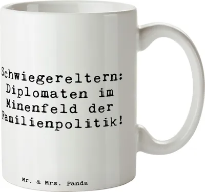 Produktbild von Mr. & Mrs. Panda Becher Spruch Schwiegereltern Diplomaten - Weiß - Geschenk, Diplomatie, einzigartig, Tasse, Kaffeebecher, Geschenkideen, Familie, Dankeschön, Lächeln