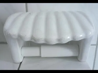 Produktbild von Toilettenpapierhalter in Form einer Muschel Dekor weiß