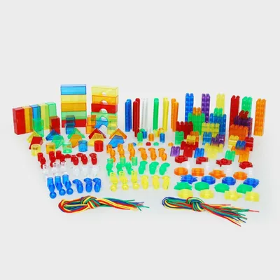 Produktbild von TickiT bunte transparente Formen Lernspielzeug-Set - 634 Teile