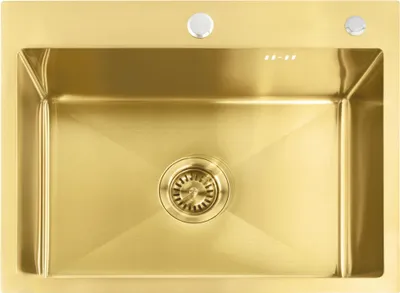 A top-down view of a gold sink with a drain.
