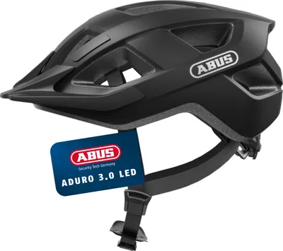 A black bicycle helmet with a tag attached.