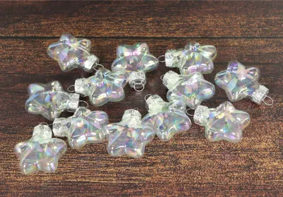 Produktbild von GOLDBACH Christbaumschmuck / Weihnachtdeko Sterne im 12er-Set, aus Glas, klar/irisierend, mit Oese, ca. Ø 4 x 2 x 4 cm