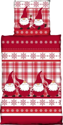 A folded duvet cover with a Christmas gnome pattern.