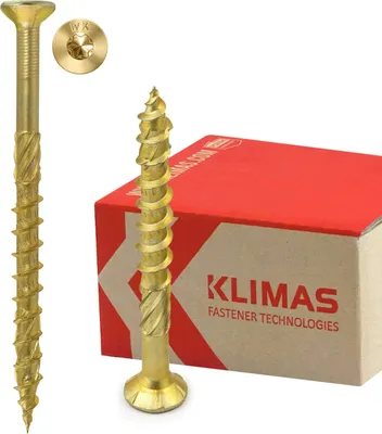 A close-up of a gold screw next to a red and brown box with the brand name KLIMAS printed on it.