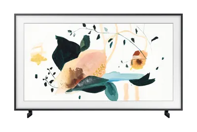 A Samsung The Frame TV displaying abstract art, placed on its stand.