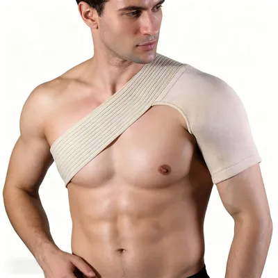 Produktbild von Schulterbandage 15 x 35 cm, doppelte Kompression, hautfarben, für Sport