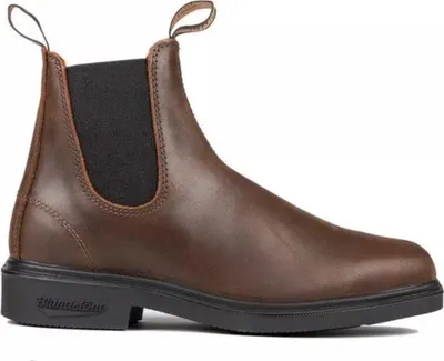 A brown leather Blundstone boot is shown against a white background.
