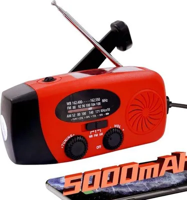 Zdjęcie produktu dla Radio solarne, AM/FM/NOAA, 4 tryby pracy, gniazdo słuchawkowe, latarka LED, alarm SOS, samonapędzająca się ładowarka do telefonu, do biwakowania i sytuacji survivalowych