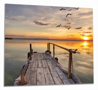 Produktbild von Wallario Herdabdeckplatte aus Glas, Größe 60 x 52 cm 2-teilig, Motiv Sonnenuntergang über dem See  idyllischer Steg