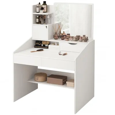 A white vanity table with a mirror and various makeup products displayed on it.