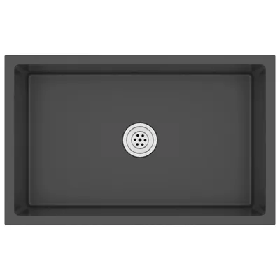 A top-down view of a dark gray rectangular sink with a silver drain in the center.