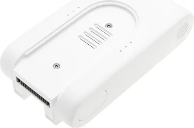 A white battery pack for a vacuum cleaner is shown against a white background.