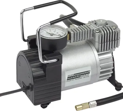 A portable air compressor with a pressure gauge.