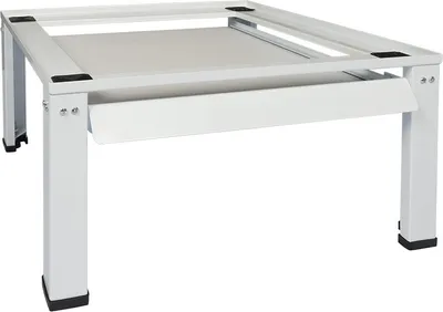 A white metal stand for a washing machine, with a grey top surface and black feet.