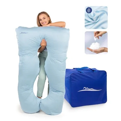 A woman is posing with a large U-shaped pillow. There are also inset images showing the fabric and filling of the pillow, and a blue storage bag.