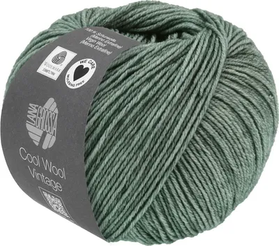 A ball of green-grey yarn with a label.