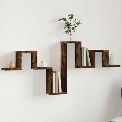 A wooden wall shelf with decorative items on a white wall.