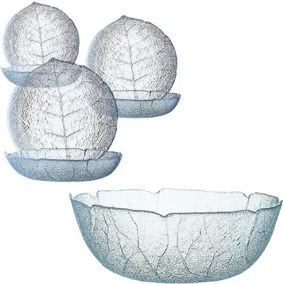 A set of glass bowls and plates with a leaf pattern.