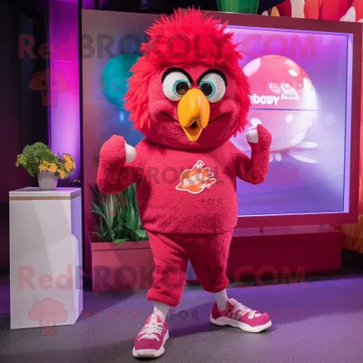 Produktbild von Maskottchen REDBROKOLY Kostümfigur mit magentafarbenem Huhn und Parmesan bekleidet mit einer Jogginghose und Broschen