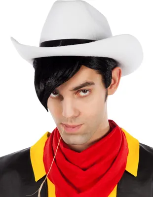 A man wearing a cowboy hat, wig, and bandana.
