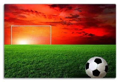 Produktbild von Wallario Frühstücksbrettchen aus Glas 20 x 30 cm mit rutschfesten Füßen, Motiv Fußball - Fußballfeld bei Sonnenuntergang