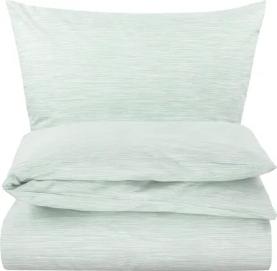 A stack of bedding with a striped pattern.