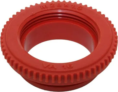 A red plastic fitting with text on it, isolated on a white background.