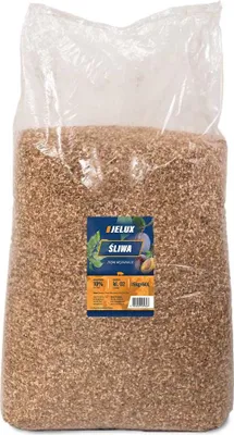 A large bag of wood chips with a label.