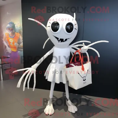 Produktbild von Maskottchen REDBROKOLY einer weißen Spinne mit Cocktailkleid und Tragetaschen
