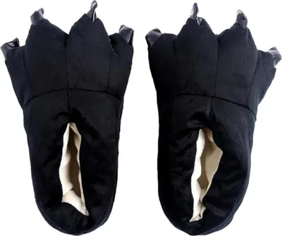 A pair of black slippers shaped like monster or dragon feet with claws, shown from a front-facing perspective against a white background.