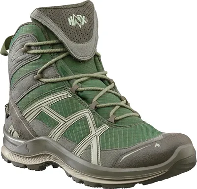 A single green and gray hiking boot is shown against a white background.