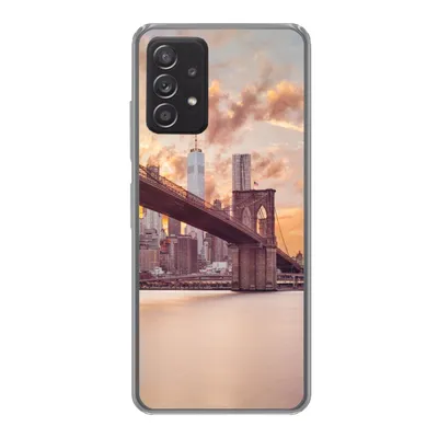 Produktbild von MuchoWow® Handyhülle Schutzhülle Hülle für Samsung galaxy a73 Brooklyn Bridge und die New Yorker Skyline bei Sonnenuntergang Silikon Softcase Handy Hülle - Handyhülle