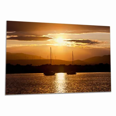Produktbild von Wallario Herdabdeckplatte aus Glas, Größe 80 x 52 cm 1-teilig, Motiv Schiffe in der Abenddämmerung auf dem Meer