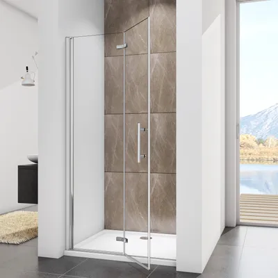 A modern bathroom with a glass shower enclosure.