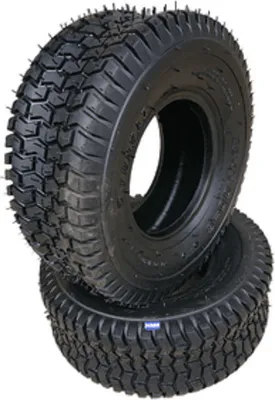 Two tires are stacked on top of each other against a white background.