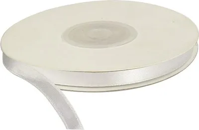 A roll of white satin ribbon is shown on a white background.