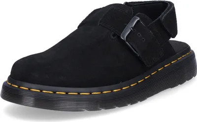 A black Dr. Martens shoe is shown from a side-angle on a white background.