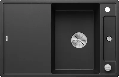 A top-down view of a black kitchen sink with a draining board and a separate compartment for a faucet.