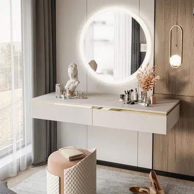 A modern vanity table with a round illuminated mirror, makeup, and a decorative bust, set in a well-lit room with a large window and curtains.