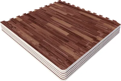 A stack of interlocking foam mats with a wood grain pattern.
