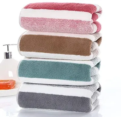 Produktbild von Unyqoos® 4er-Set Mikrofaser-Handtücher – weich, saugfähig & schnelltrocknend, 35,6 x 76,2 cm, mit Aufhängeschlaufe, maschinenwaschbar