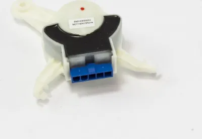 A close-up shot of a white electronic component with a blue connector.