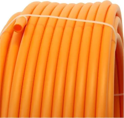 A close-up view of a coiled orange plastic tube.