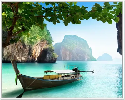 Produktbild von Wallario Wandbild Fischerboot in Thailand  blaues Meer und Steinfelsen, Größe: 40,30 x 50,30 cm, Poster mit weißem Aluminiumrahmen