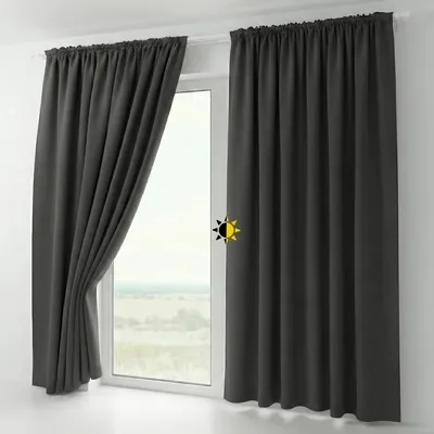 A window with dark gray curtains.